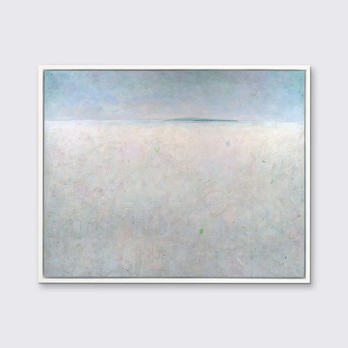 A light blue and white abstract landscape print in a white floater frame hangs on a white wall.