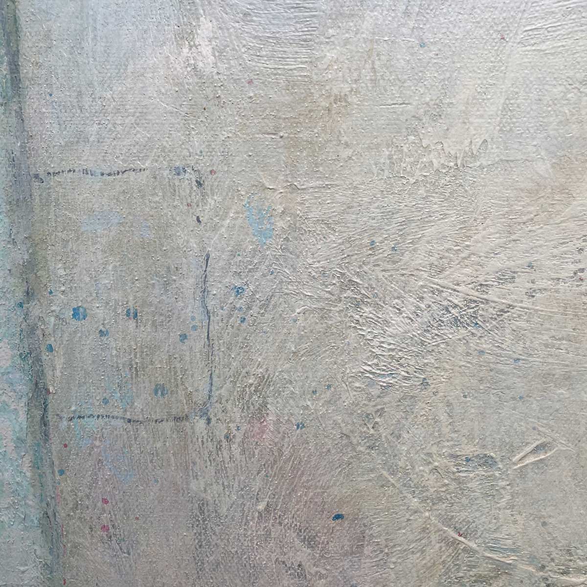 A close up view of white and some parts of light blue, the outline of a shape and the texture of the painting.