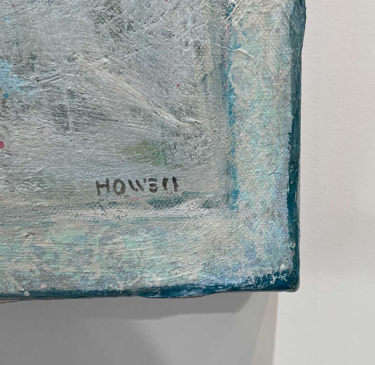 A close up view of the artist's signature in the bottom right-hand corner.