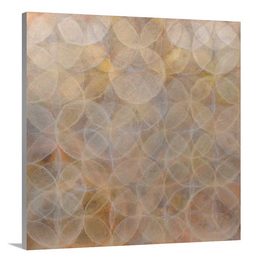 A side-angle view of a dark yellow and white geometric overlapping circle print on canvas.