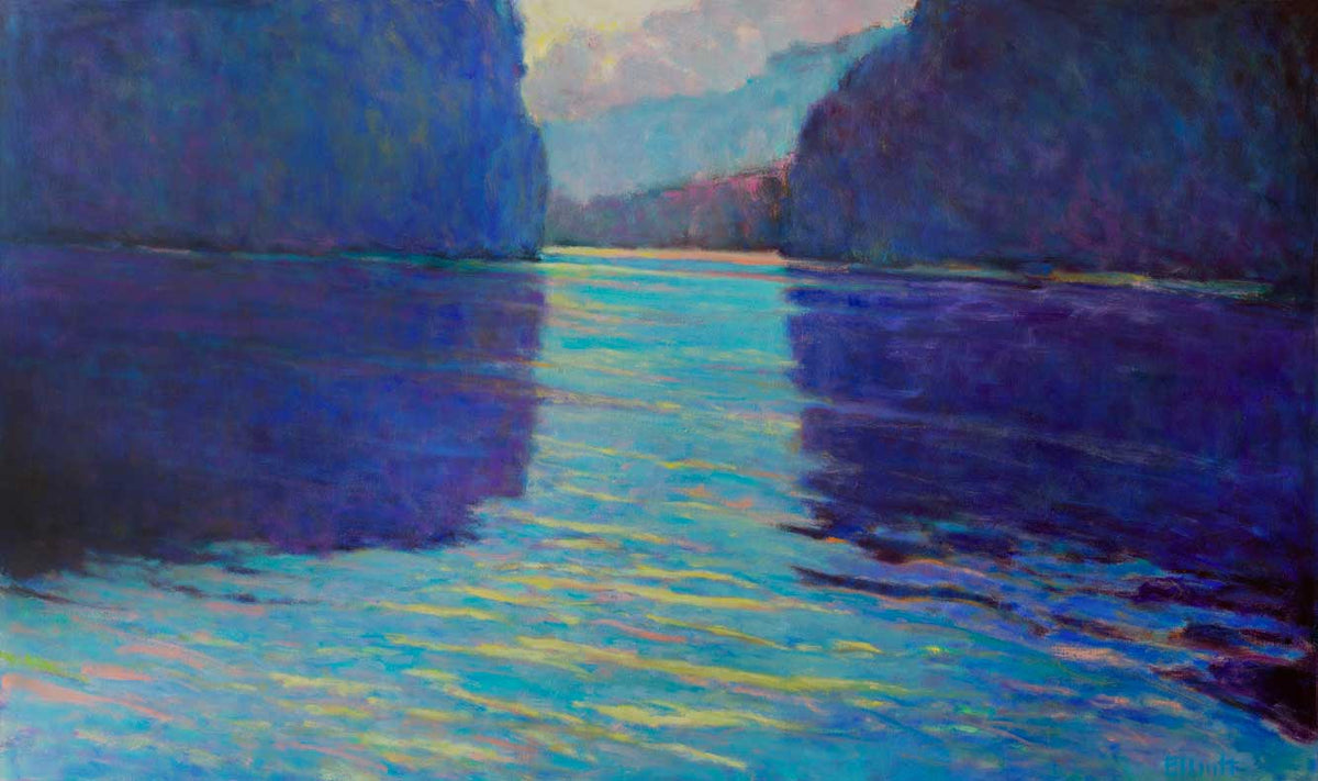 A cerulean blue body of water gives way to two large blue mountains on each side with yellow and pink accents in the water.