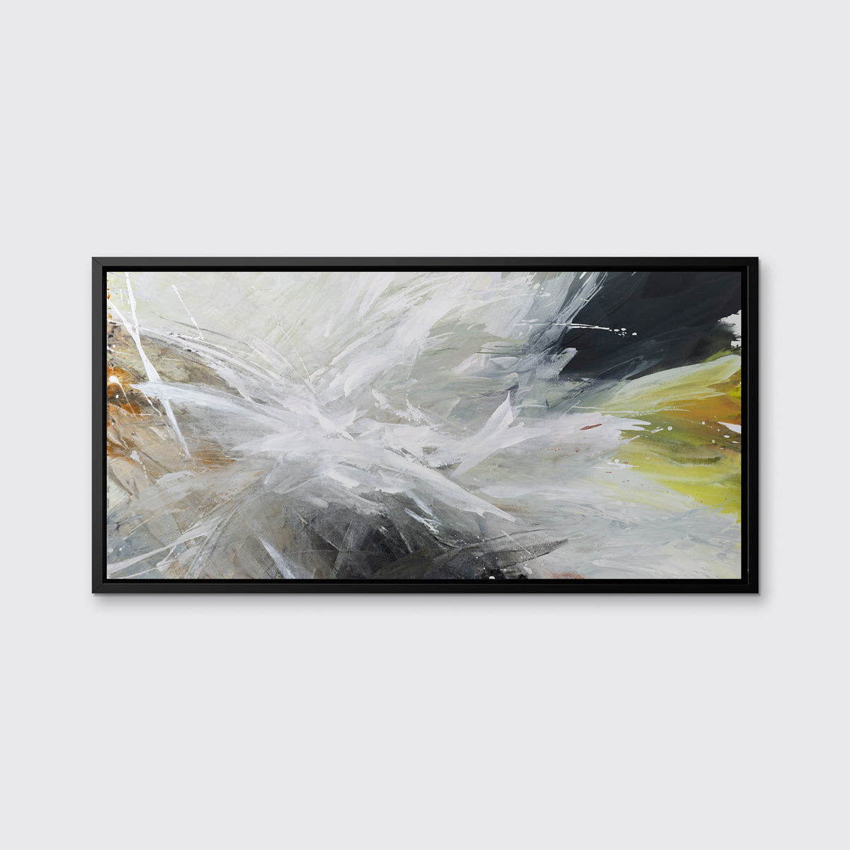 A white, black, grey and gold abstract print in a black floater frame hangs on a white wall.