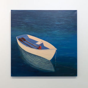 A painting of a white rowboat in deep blue water is hung on a gallery wall.