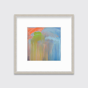 A blue, orange and green abstract print in a silver frame with a mat hangs on a white wall.