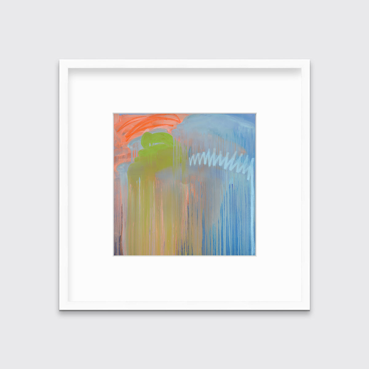 A blue, orange and green abstract print in a white frame with a mat hangs on a white wall.