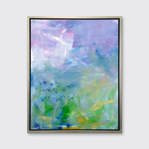 A blue, purple and green abstract print in a silver floater frame hangs on a white wall.