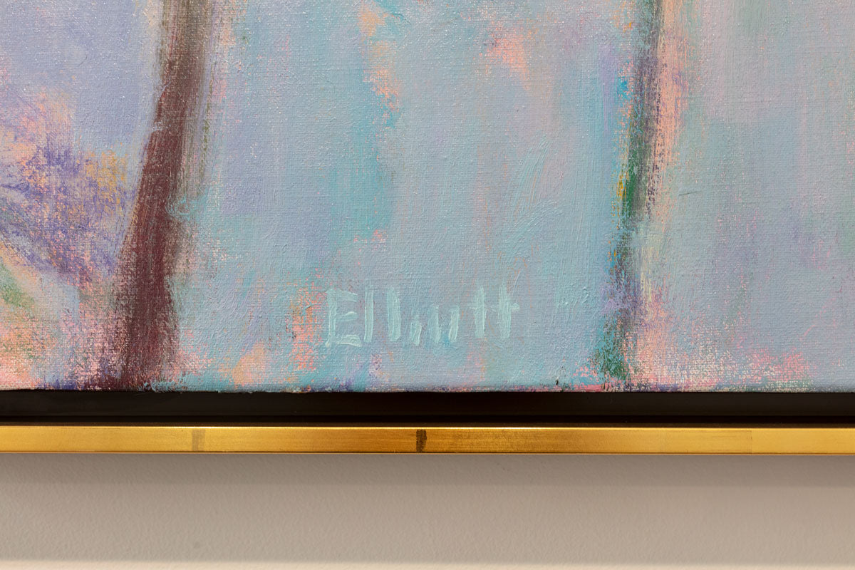 A detail image of Ken Elliott's signature on an impressionistic landscape painting in a gold floater frame.