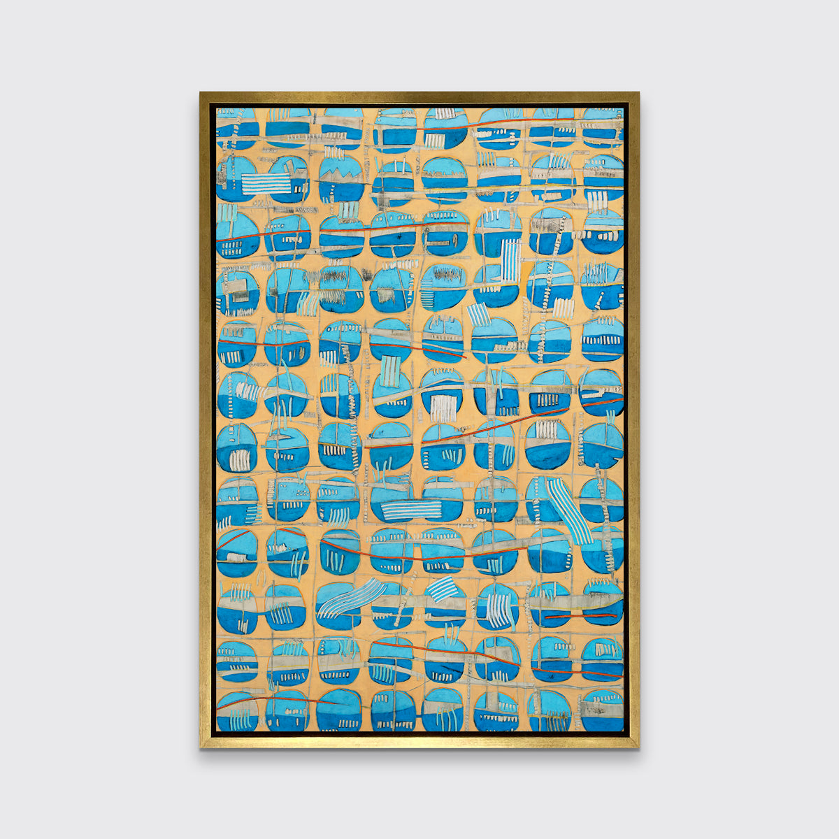 An orange, blue and light blue abstract print in a gold floater frame hangs on a white wall.