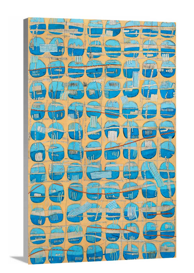 A side-angle view of an orange, blue and light blue abstract print on canvas.