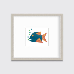 A print of a blue, orange and yellow fish. Matted in a silver frame. 