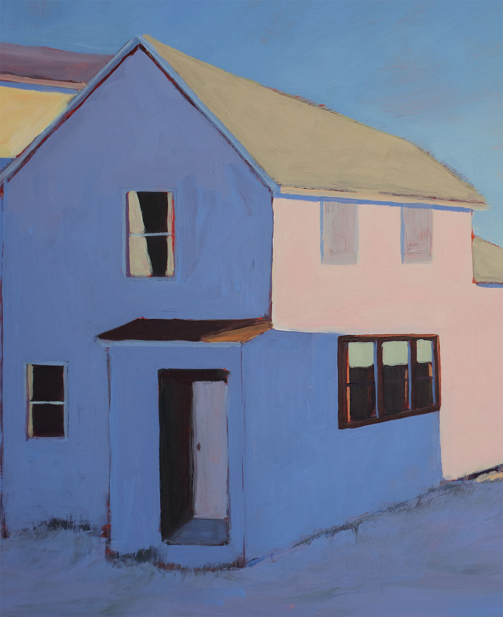 Close up view of one of the beach houses with the strong contrast of light and dark from the casting shadow.