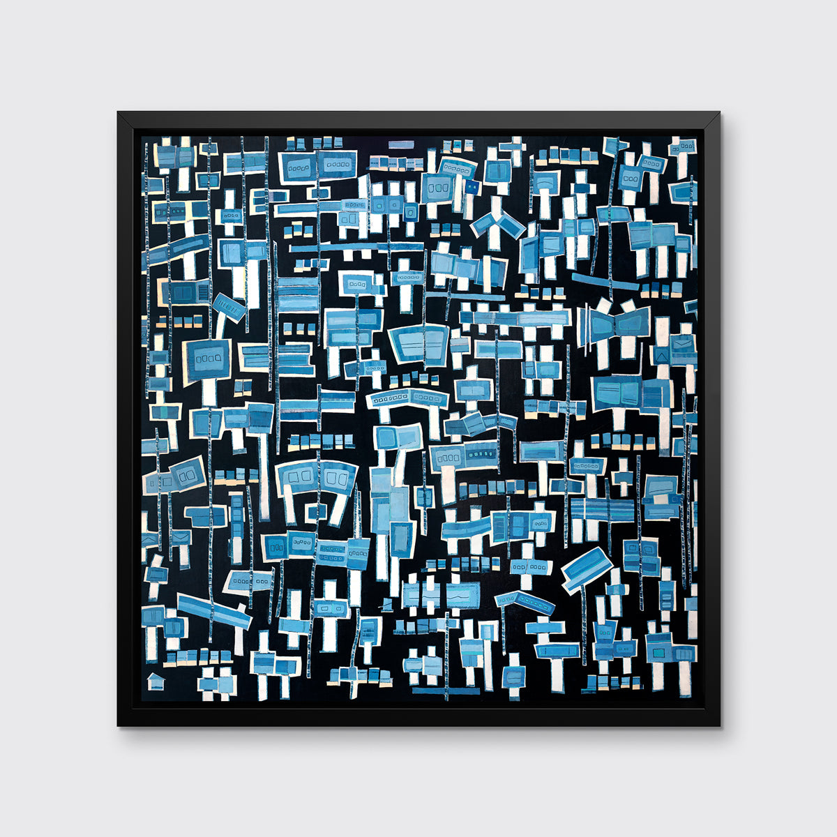 A blue, white and black abstract print in a black floater frame hangs on a white wall.