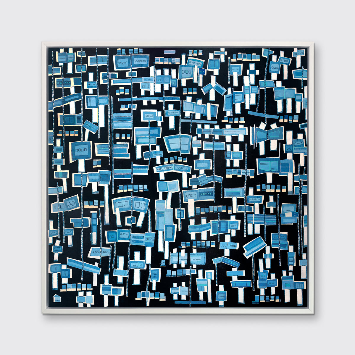 A blue, white and black abstract print in a white floater frame hangs on a white wall.