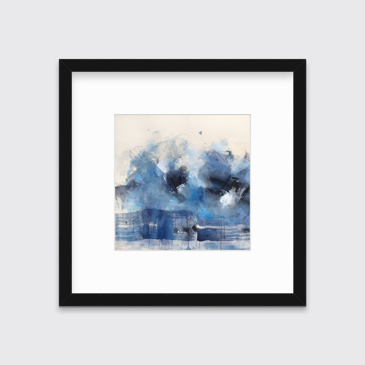 A blue, beige, white and black abstract print in a black frame with a mat hangs on a white wall.