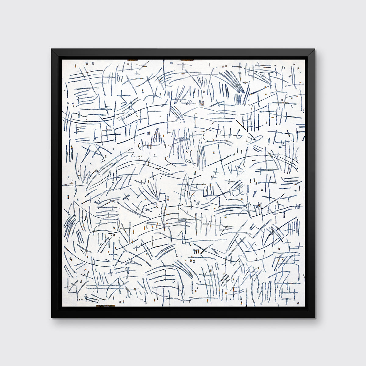 A white and blue abstract print in a black floater frame hangs on a white wall.