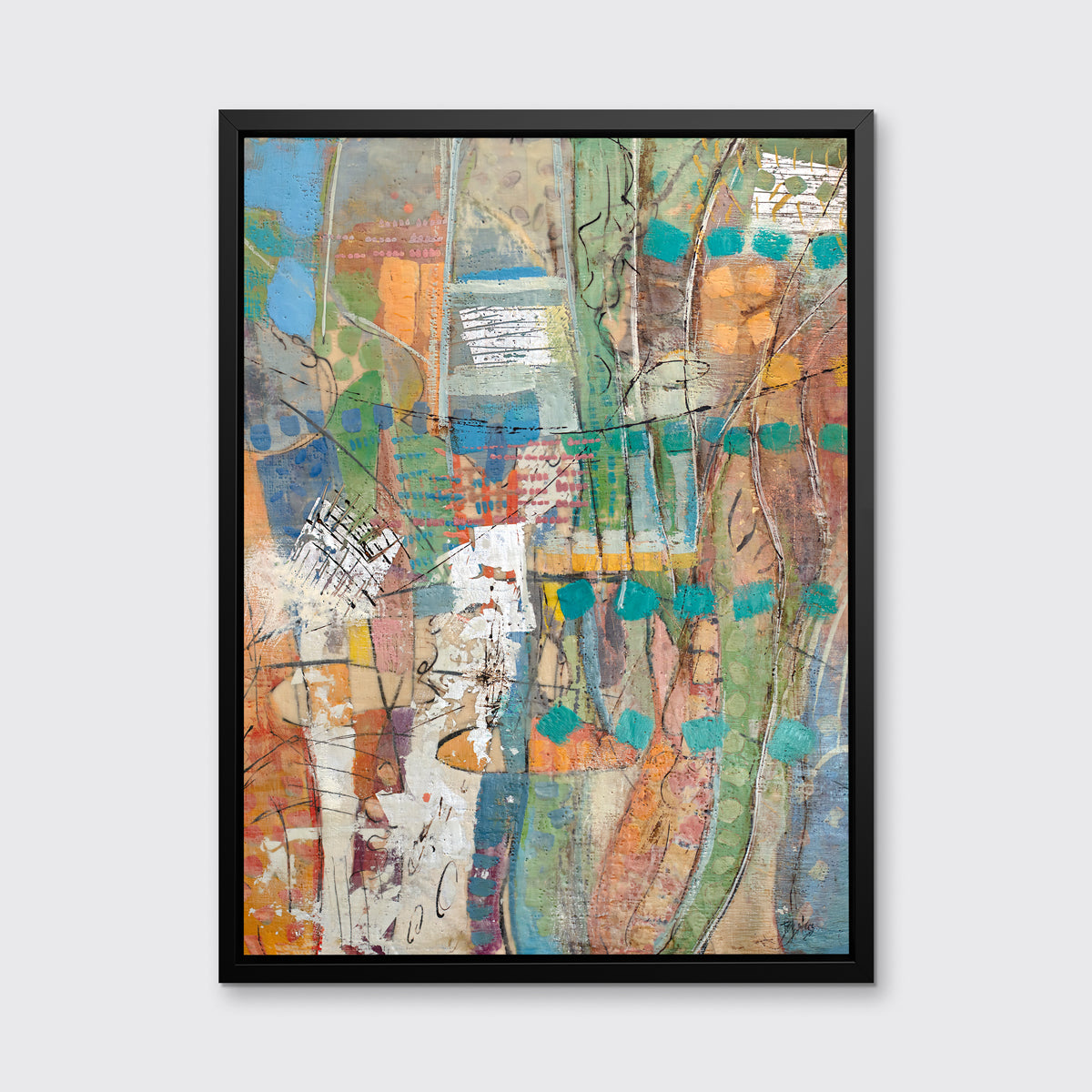 A multicolored abstract print, framed in a black floater frame hanging on a white wall.