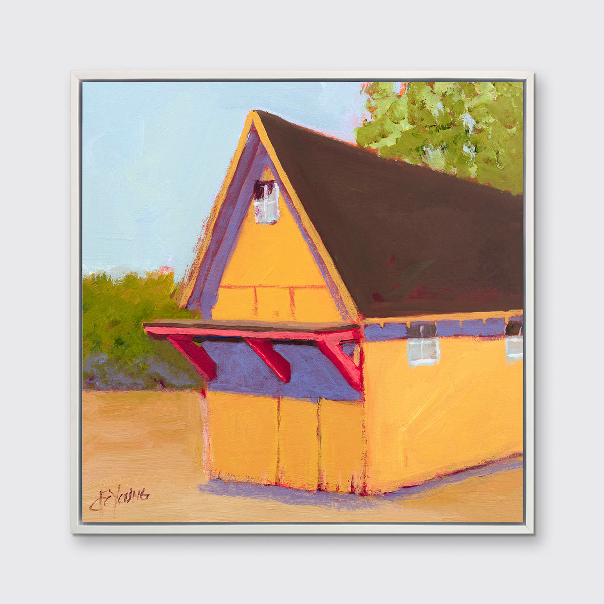 A yellow, orange, lavender and blue contemporary barn print in a white floater frame hangs on a white wall.