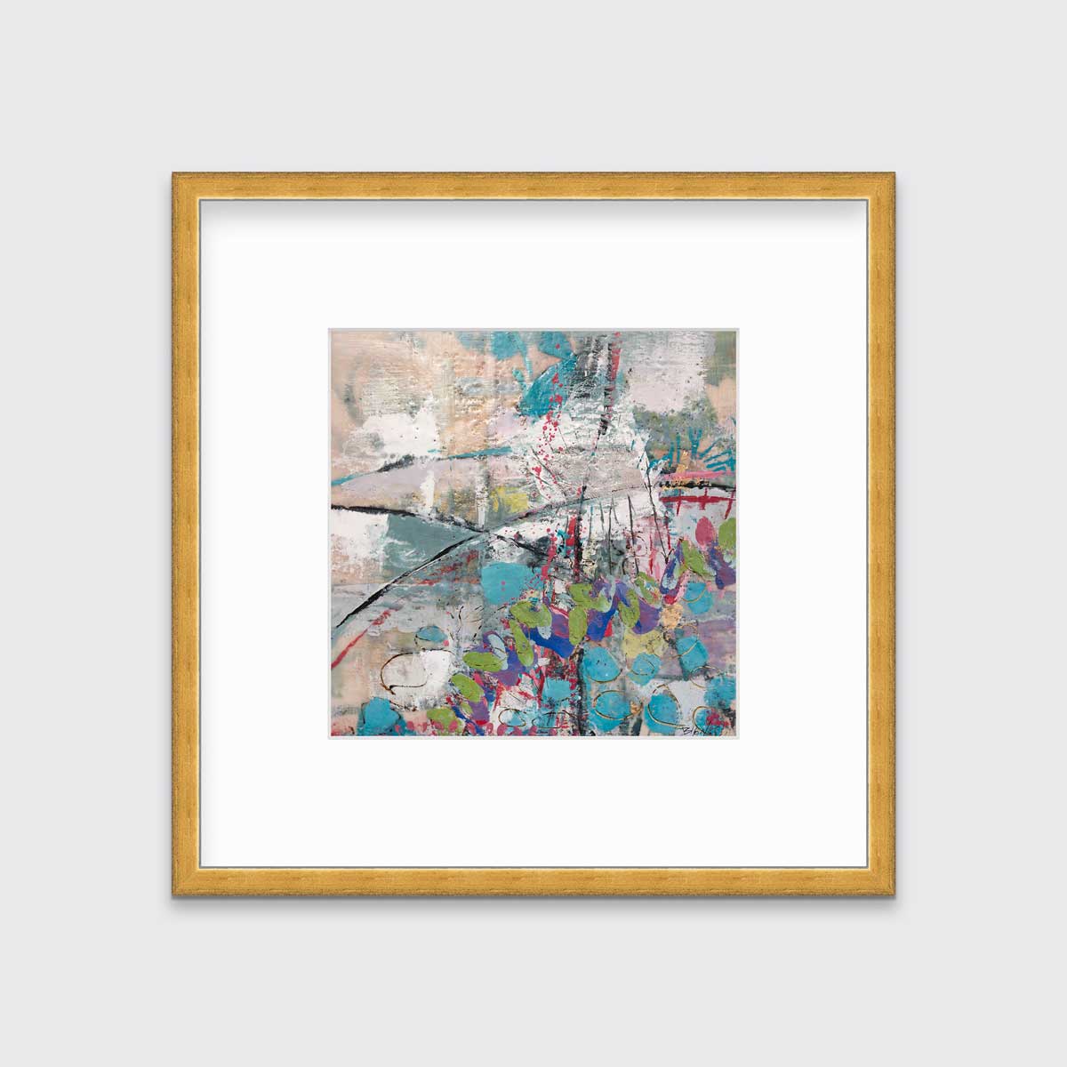 A turquoise, green, beige and pink abstract print in a gold frame with a mat hangs on a white wall.