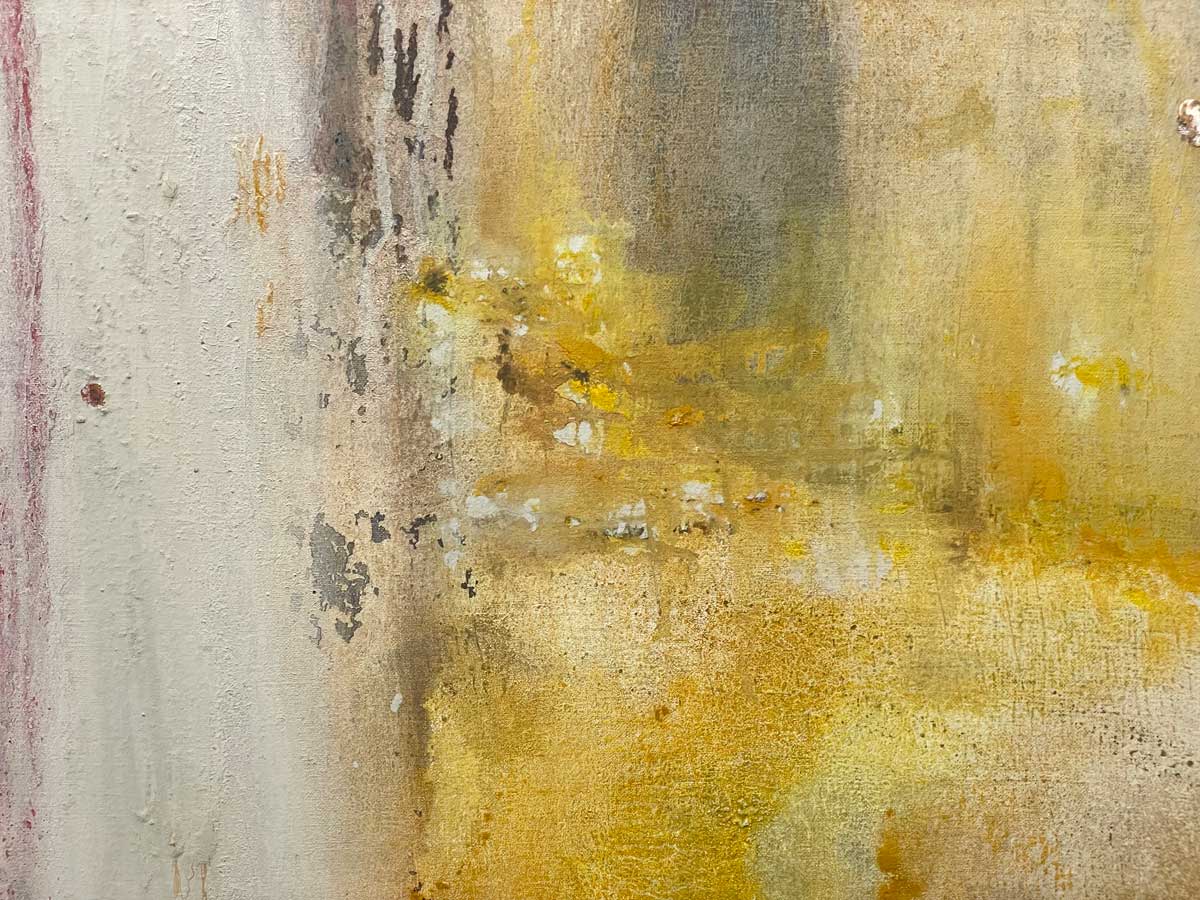 A close up of white and yellow paint.