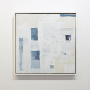 A white and beige abstract painting with blue and black rectangular forms is hung on a gallery wall. Wired and ready to hang.