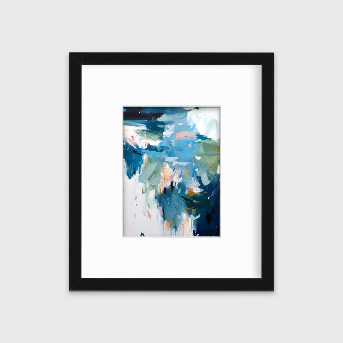 A blue abstract print by Kelly Rossetti in a black frame with a mat hangs on a white wall.