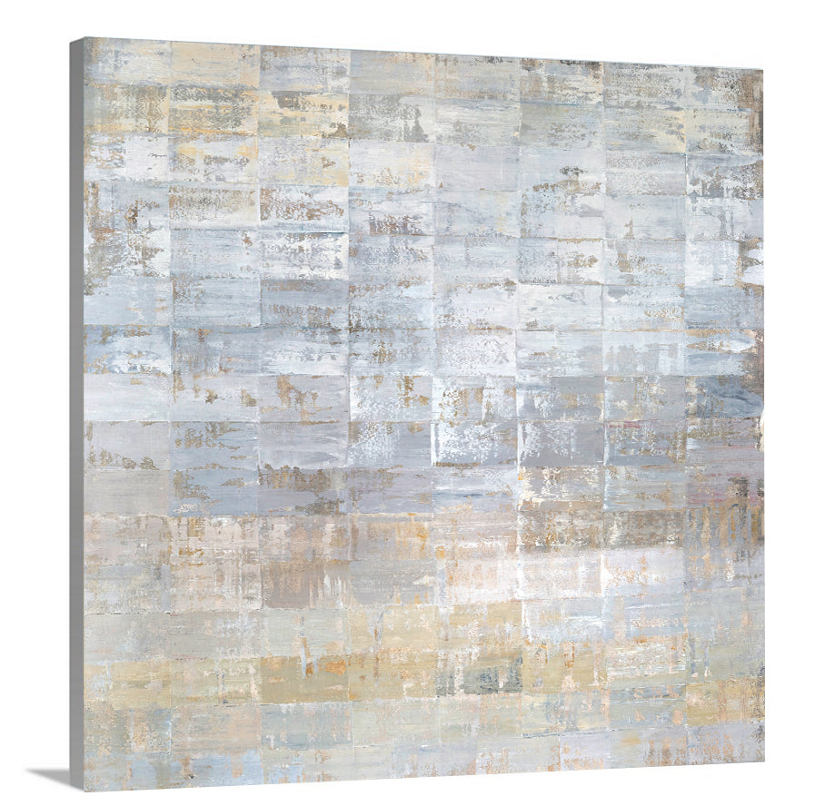 A side-angle view of a grey, silver and light gold abstract geometric print on canvas.