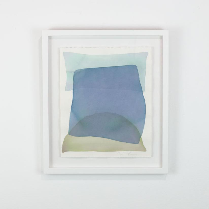 A watercolor of light azure, blue, and yellow forms overlapping is hung on a gallery wall. Wired and ready to hang.