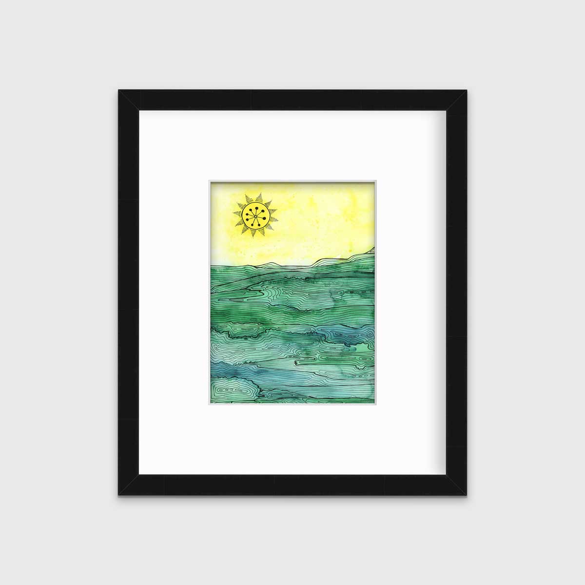 A green and yellow abstract landscape framed in a black frame with a mat hangs on a white wall.