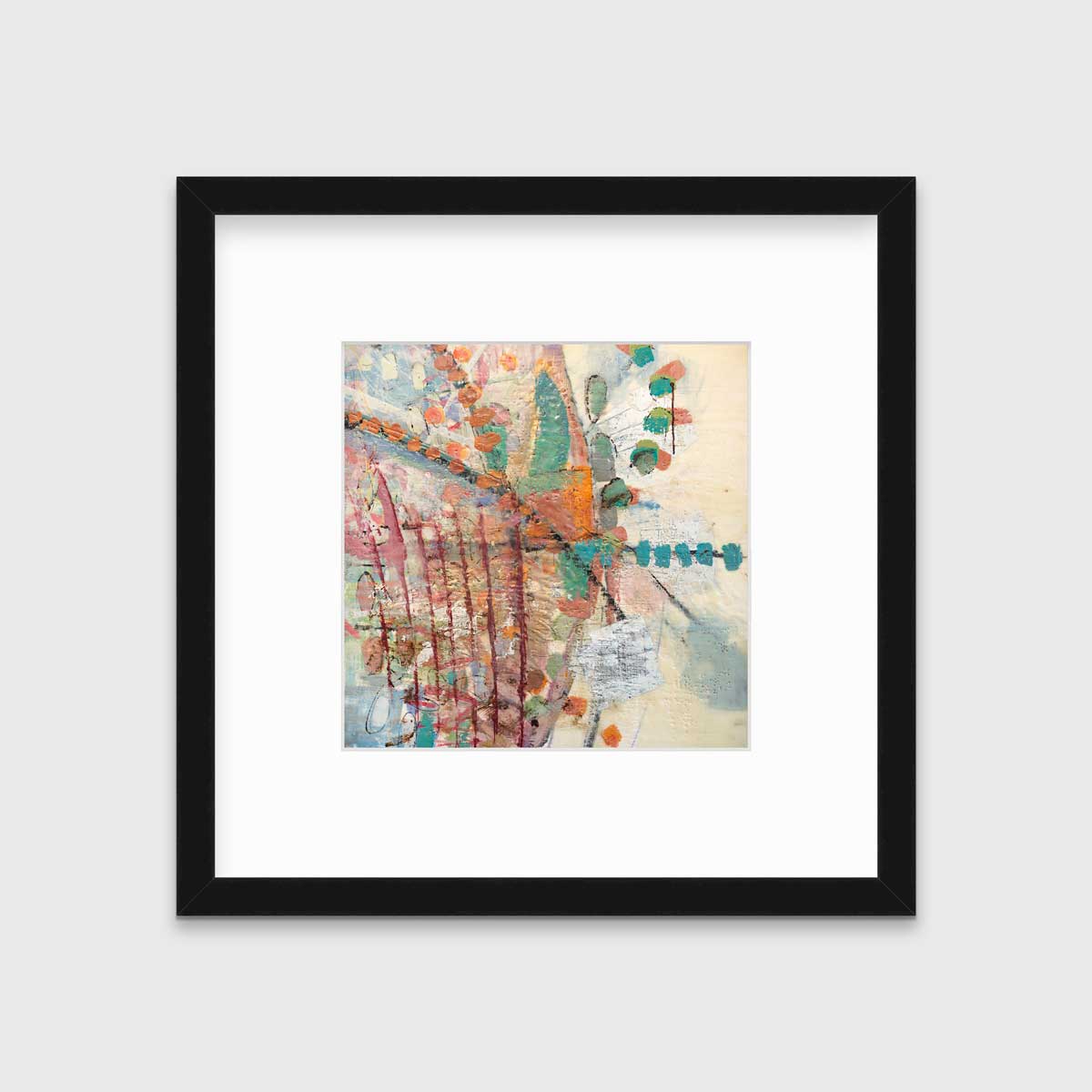 A multicolored abstract print in a black frame with a mat hangs on a white wall.