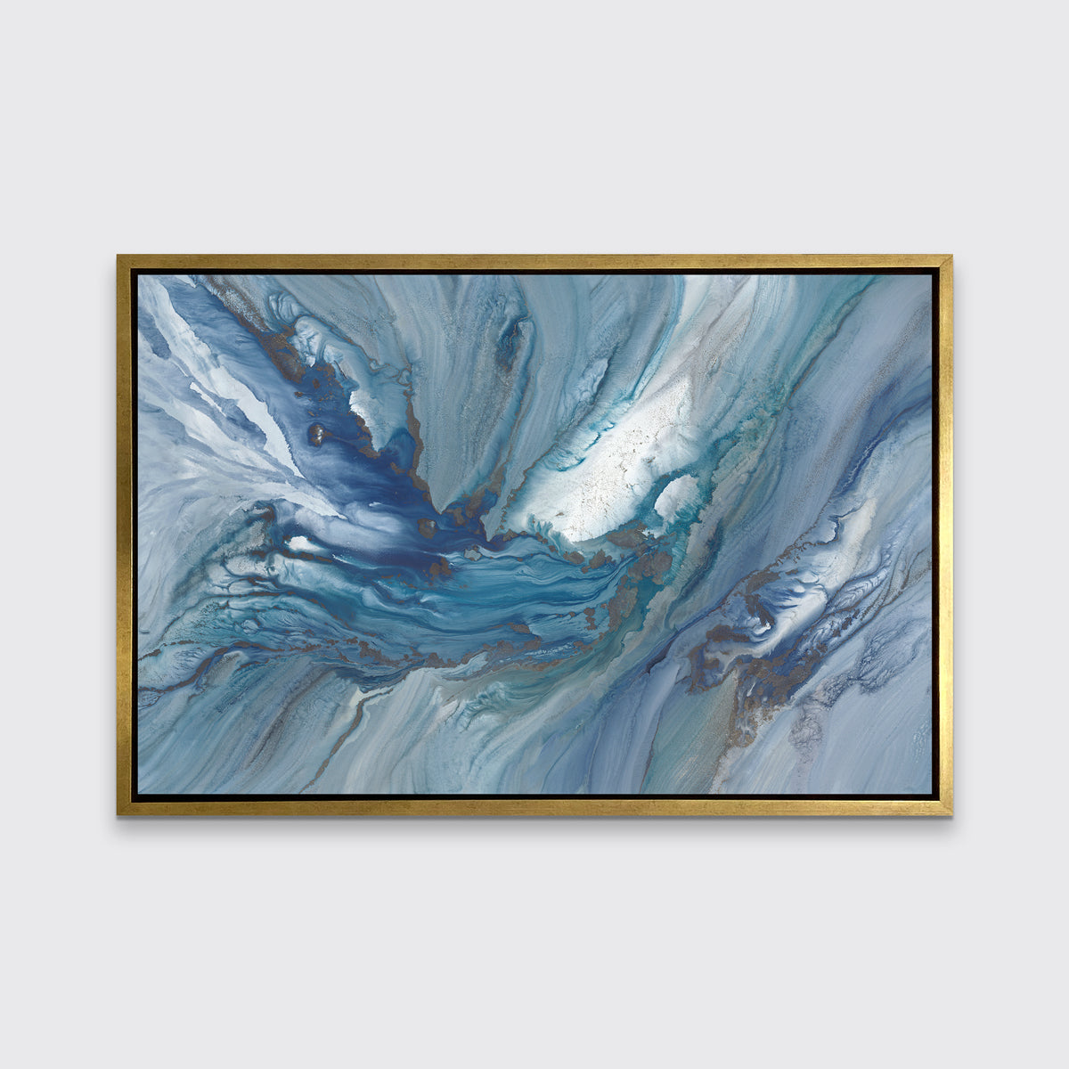 A blue, teal and white abstract print in a gold floater frame hangs on white wall.