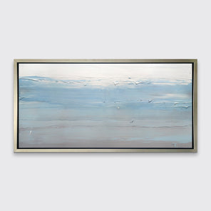 A blue, grey and grey-beige abstract print in a silver floater frame hangs on a white wall.