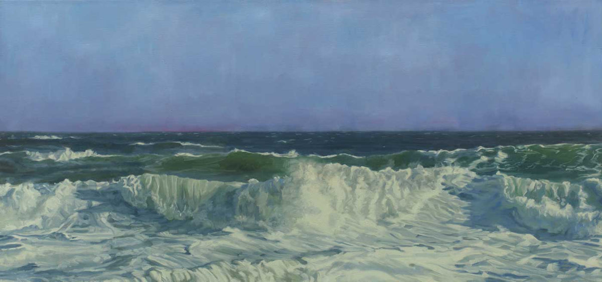 A print of the ocean with rolling waves and clear blue sky.