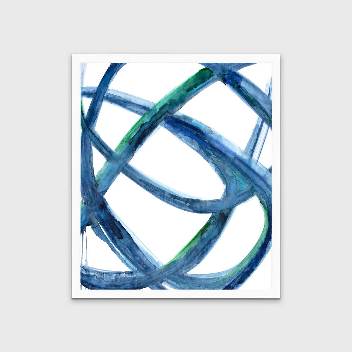 A blue, green and white abstract print in an unmatted white frame hangs on a white wall.