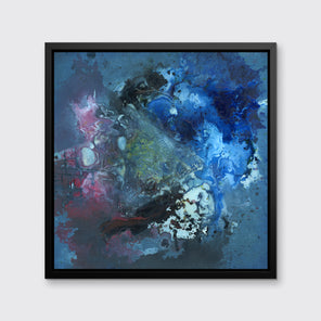 A blue, red, black and green abstract print in a black floater frame hangs on a white wall.