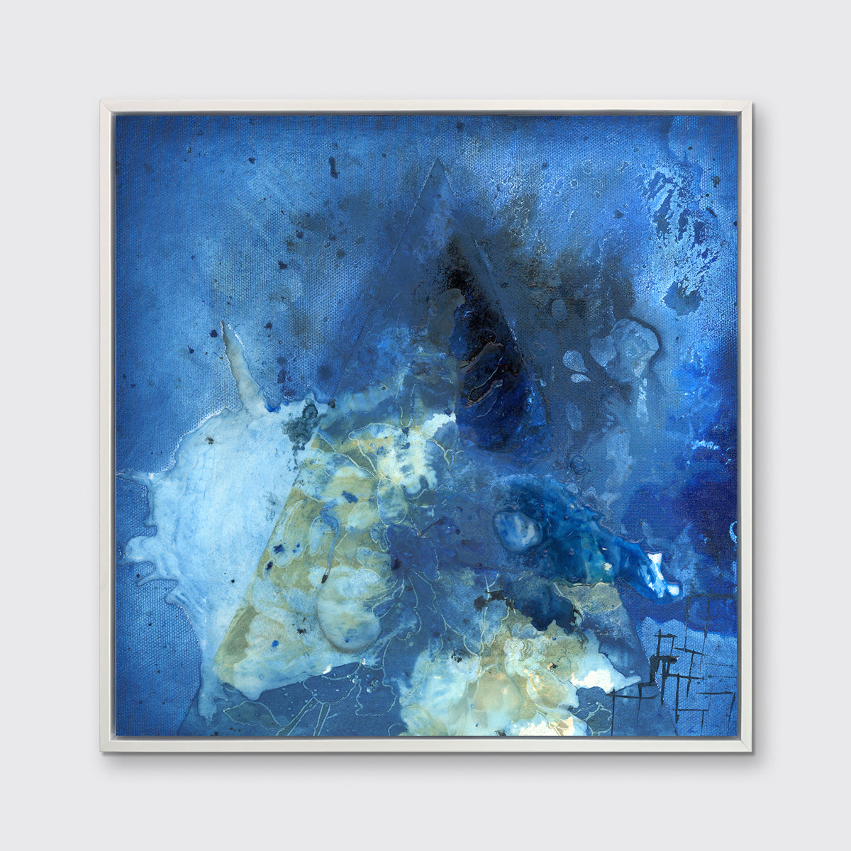 A blue, green and black abstract print in a white floater frame hangs on a white wall.