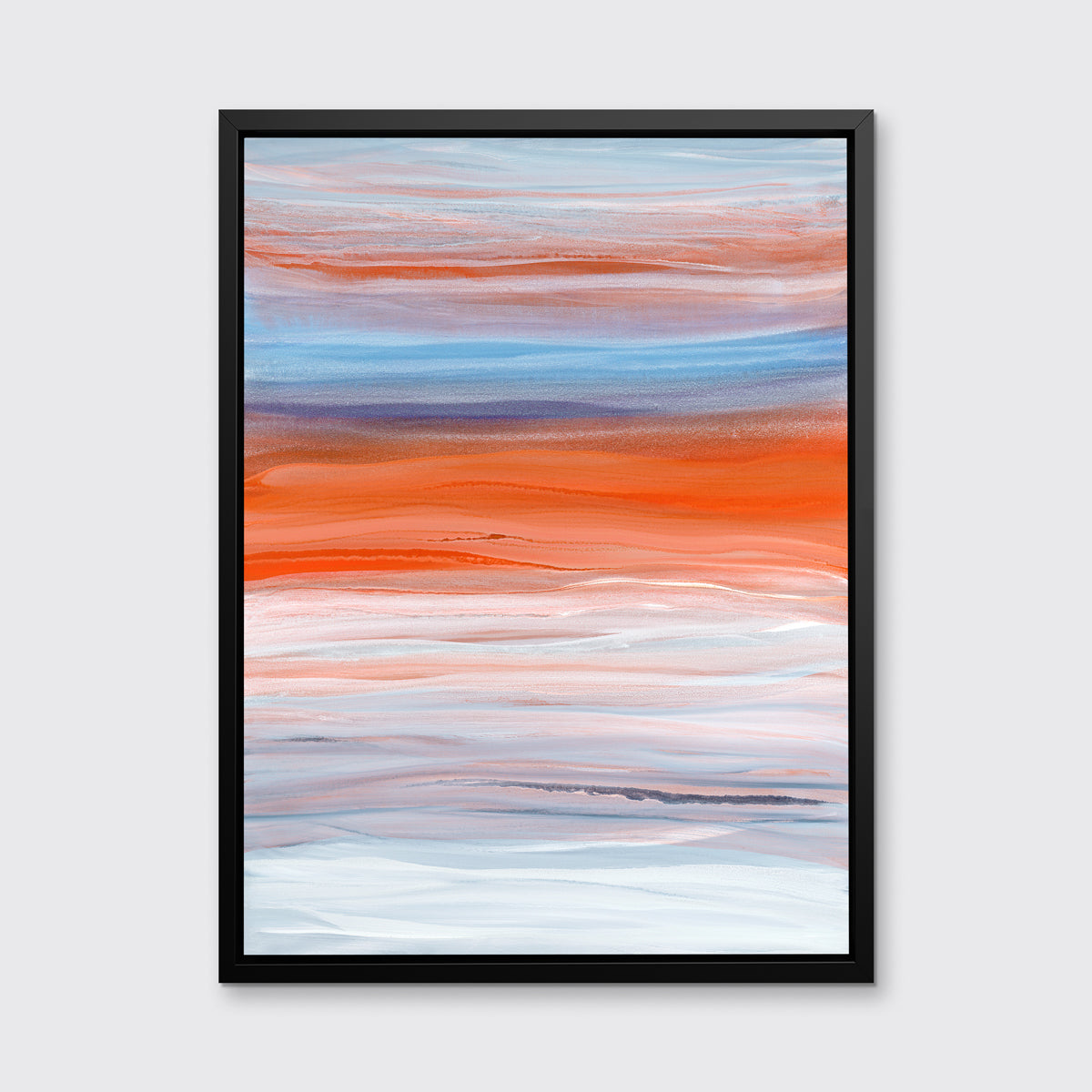 A blue, orange, light pink and white abstract print in a black floater frame hangs on a white wall.