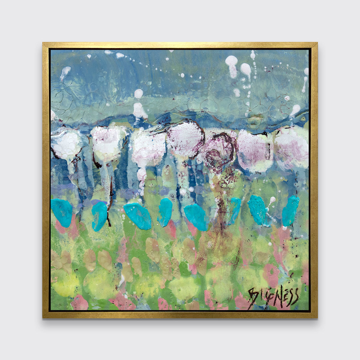 A teal, green and white abstract floral print in a gold floater frame hangs on a white wall.