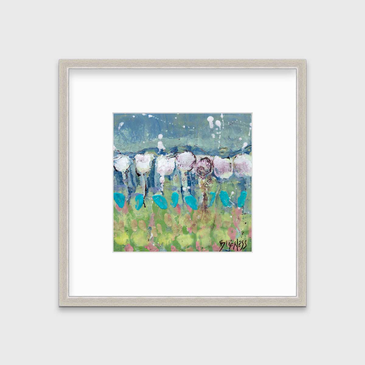 A teal, green and white abstract floral print in a silver frame with a mat hangs on a white wall.