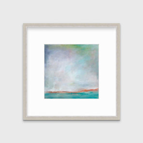A teal and white abstract print in a silver frame with a mat hangs on a white wall.