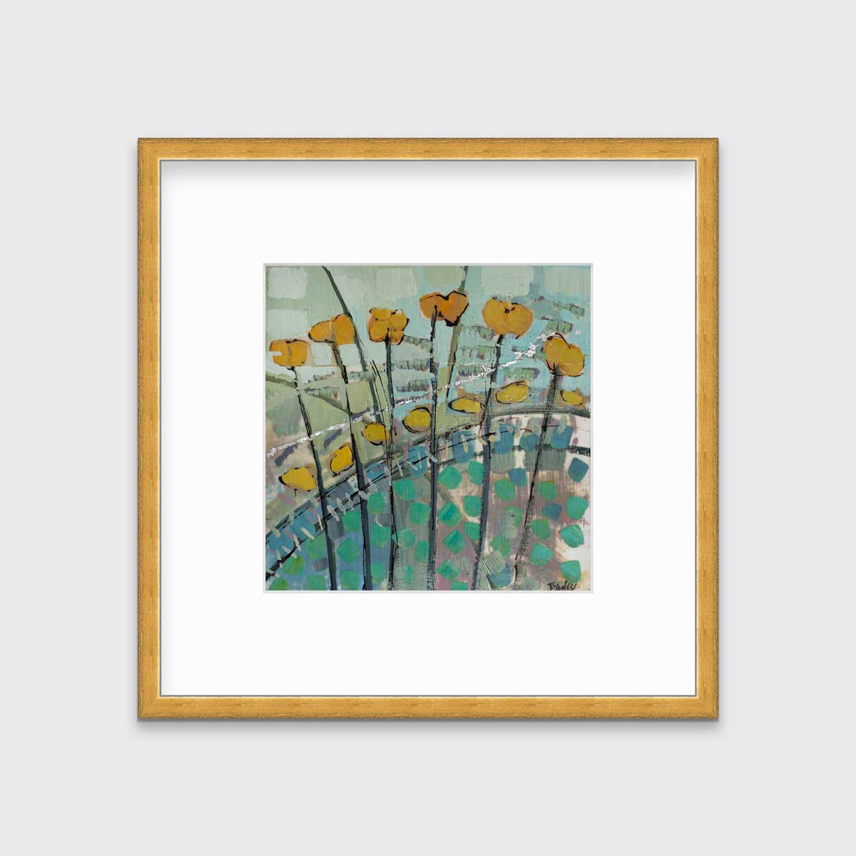A blue, yellow, and green abstract floral print in a gold frame with a mat hangs on a white wall.