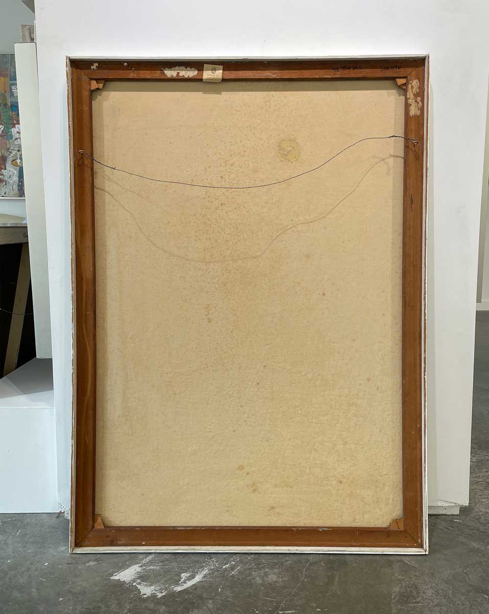 The back of the painting with the title and the hanging wire.