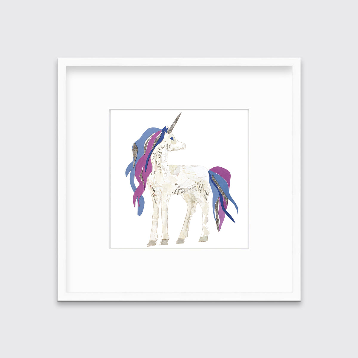A white, purple, blue and silver collaged unicorn print in a white frame with a mat hangs on a white wall.