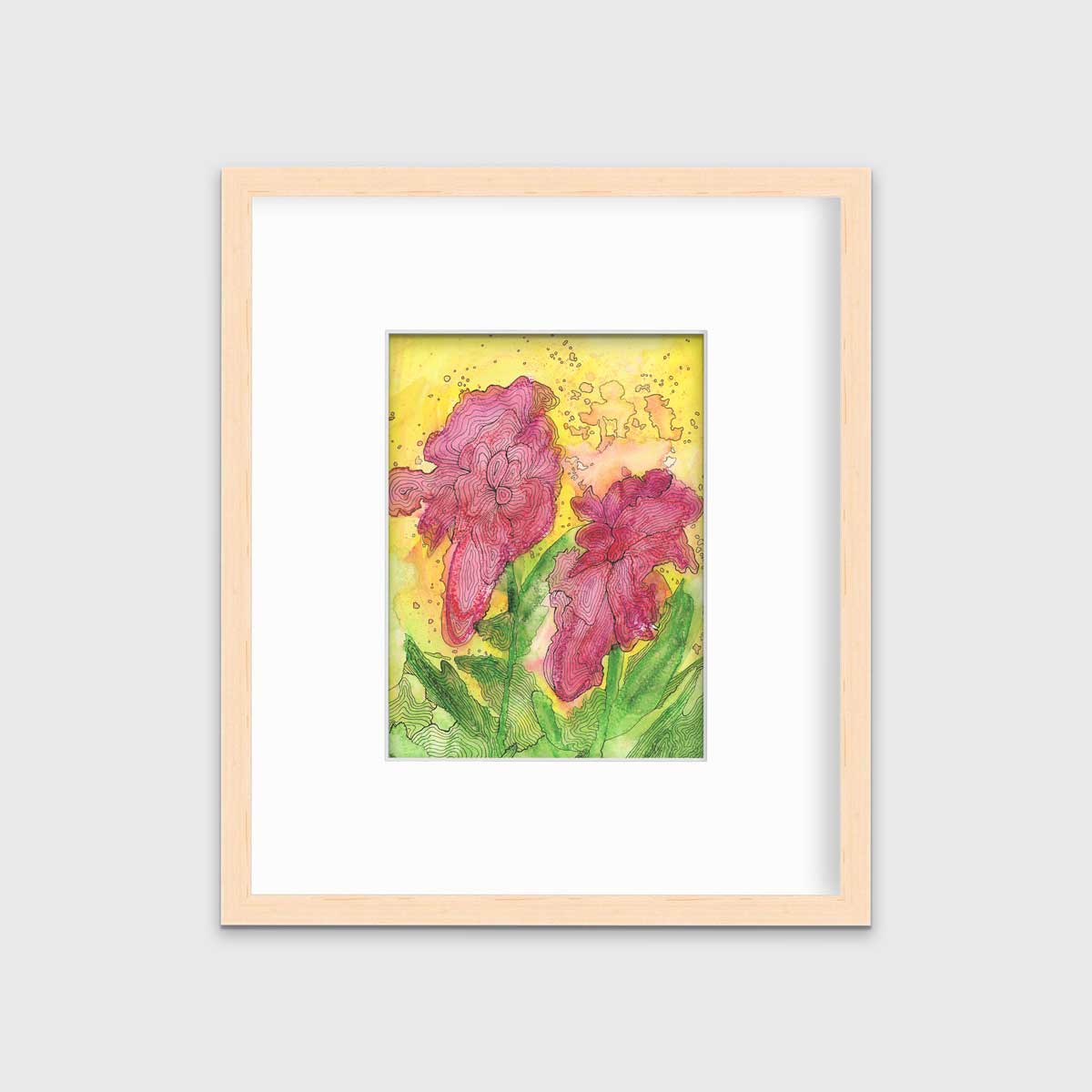 A red, yellow, green and black abstract floral print in a natural wood frame with a mat hangs on a white wall.