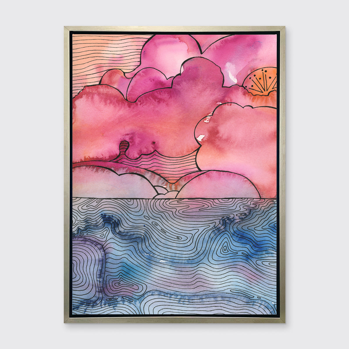 A pink, blue and black abstract landscape print in a silver floater frame hangs on a white wall.