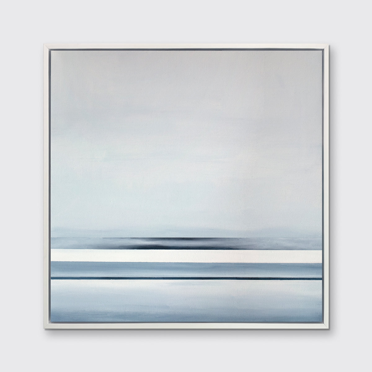 A blue and white linear abstract landscape in a white floater frame hangs on a white wall.