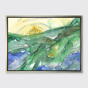 A yellow and green landscape illustration print framed in a silver frame hangs on a grey wall.