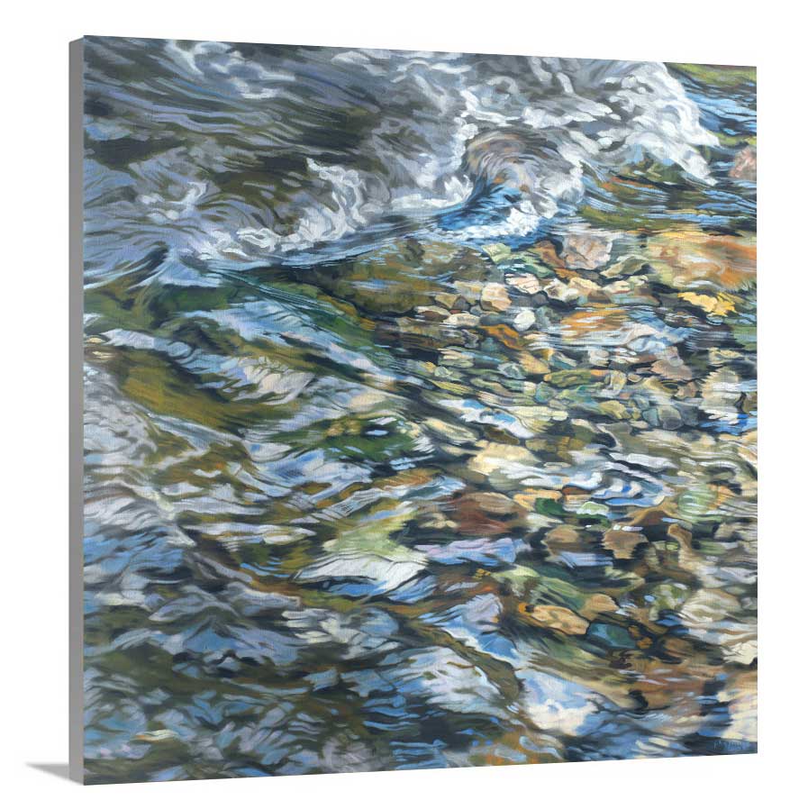 A side-angle view of an abstracted riverbed print by John Harris on canvas.