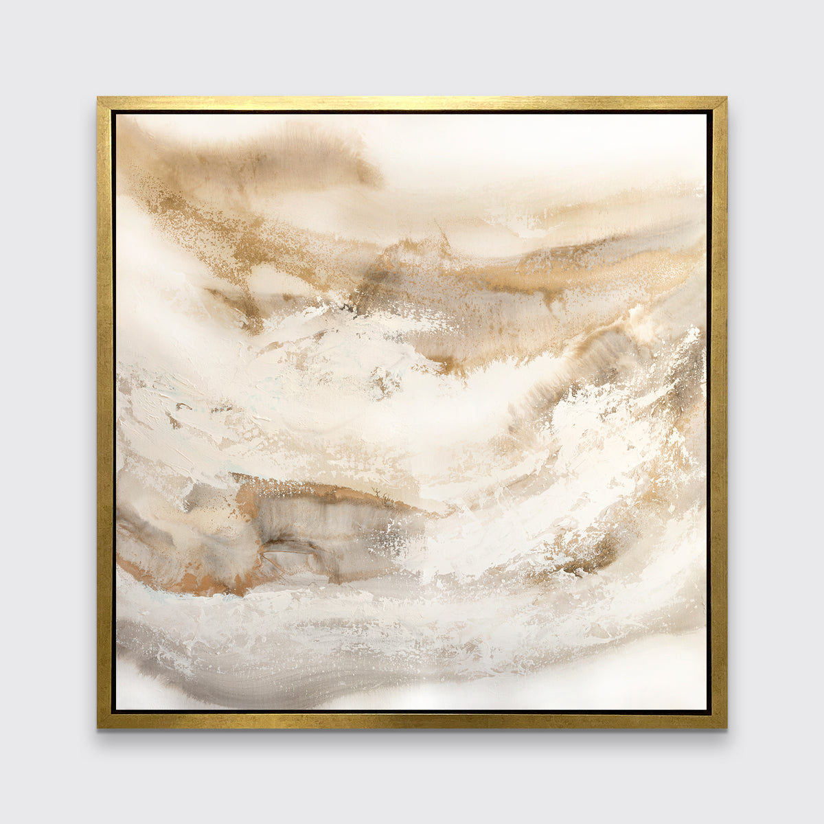 A gold, silver, white and beige abstract print in a gold floater frame hangs on a white wall.