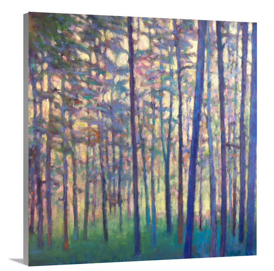 A side-angle view of a colorful tree landscape print by Ken Elliott on canvas.