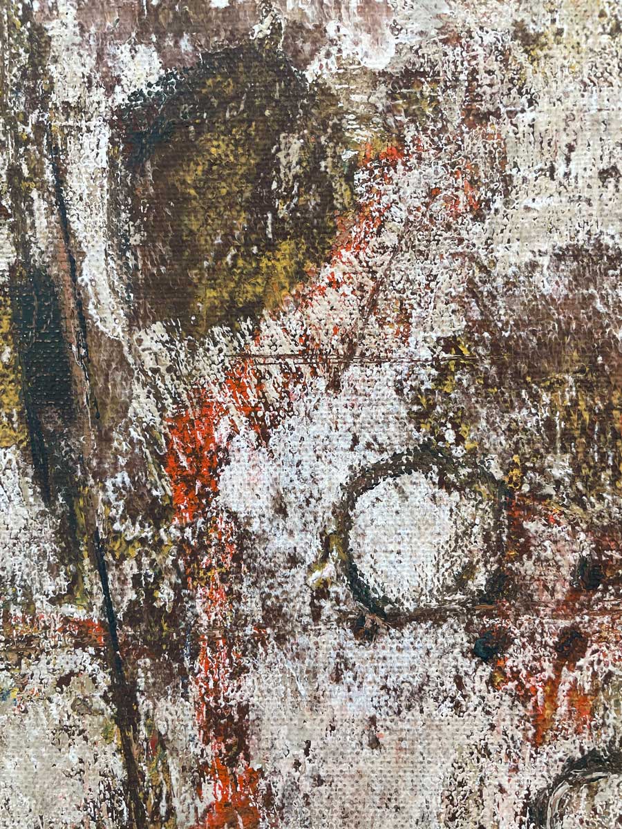 A close up detail of a brown, white and orange accents.